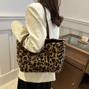 Stylish leopard print plush tote bag for women featuring soft faux fur and long straps