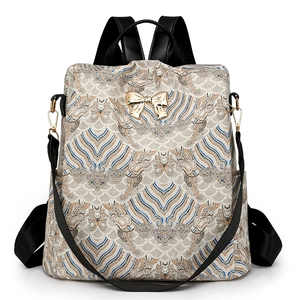 Retro vintage print large capacity women's backpack with golden bow and navy pattern
