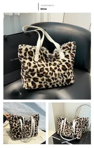Detailed close-up showing the soft plush faux fur texture of the leopard print tote bag