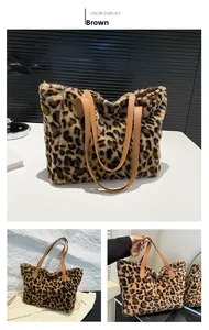 Detail of plush leopard print faux fur tote bag with brown leather handles