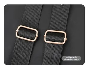 Detail of adjustable black nylon shoulder straps with premium gold metal buckles