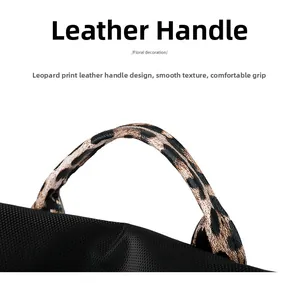 Detail of backpack featuring leopard print leather handle for comfortable carrying
