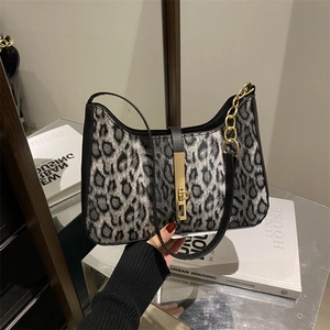 Grey leopard print underarm hobo bag with gold chain strap and black leather trim