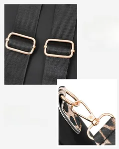 Detail of adjustable leopard print shoulder strap with gold metal hooks on black bag
