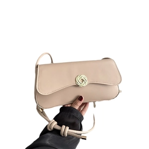 Beige minimalist square shoulder bag with golden round knot buckle and long strap