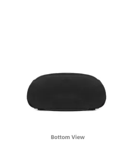 Detailed view of the wide oval bottom base on a durable black nylon backpack