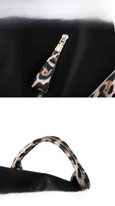 Close-up of leopard print handle and zipper pullers on black mesh backpack