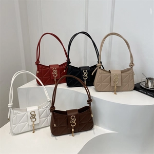 Chic quilted underarm crescent bags in white, red, black, beige and brown with gold fringe