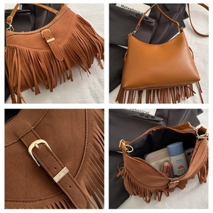 Macro detail of brown suede tote bag with fringe accents and interior storage view