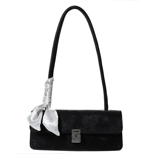Elegant black velvet underarm bag with rhinestone buckle and white silk scarf accessory
