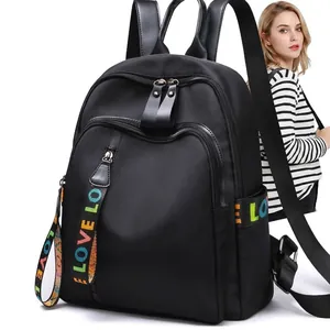 Women's black oxford backpack with colorful LOVE straps and multiple zippers
