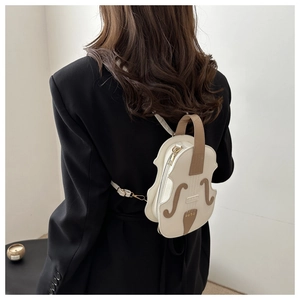 Detail of creative violin-shaped crossbody bag with exquisite stitching and PU leather