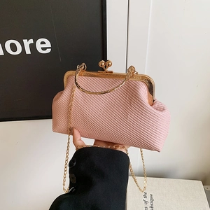 Pink woven evening clutch bag with vintage gold clasp and detachable chain strap