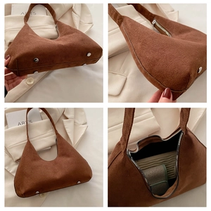 Détails du sac seau en daim marron avec rivets argentés et fermeture éclair de haute qualité
