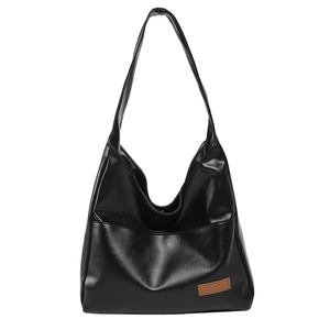 Minimalist large black leather tote bag for women with stylish brown logo patch detail