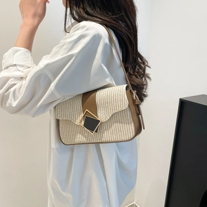 Chic woven shoulder bag with brown leather trim and a geometric gold buckle for women