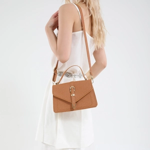 Brown vintage canvas crossbody square bag with metal buckle and shoulder strap