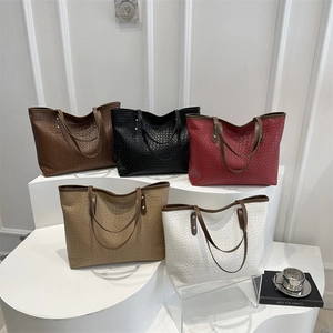 Large woven tote bag for women in five colors with spacious design and shoulder straps