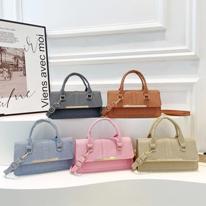 Minimalist crossbody handbags for women in five colors with golden bar detail