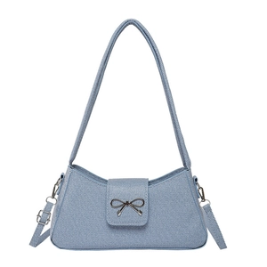 Light blue denim underarm bag with silver metal bow and adjustable shoulder straps