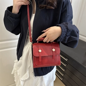 French vintage red square handbag with top handle and adjustable shoulder strap for women