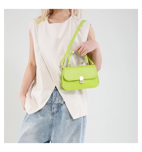 Fluorescent green leather shoulder bag with silver turn-lock and adjustable strap