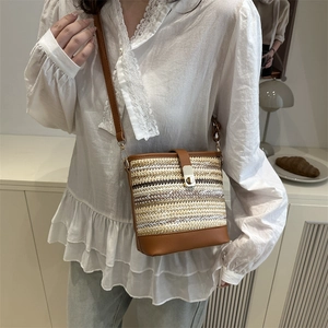 2025 stylish woven PU leather crossbody bucket bag for women in brown and white