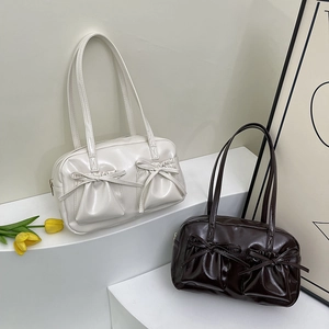 Sacs bowling pour femmes en crème et marron foncé avec poches à nœuds décoratifs