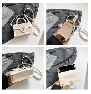 Detailed views of a beige straw texture crossbody bag with gold clover swivel lock