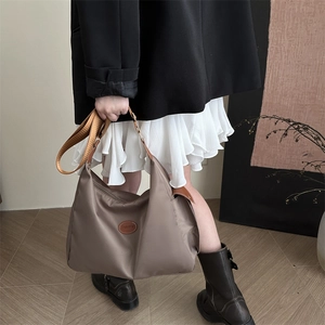 Minimalist tan large capacity shoulder bag with fashion leather patch and wide strap