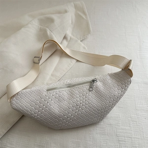 Minimalist woven leather chest bag in cream white with adjustable strap for casual style