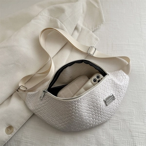 Minimalist cream woven chest bag with silver zipper and large capacity for daily use