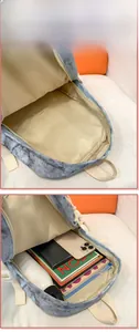 Internal display of marble pattern backpack showing spacious compartments and storage capacity