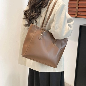 Brown large capacity matte PU leather tote bag with slim shoulder straps for commuting