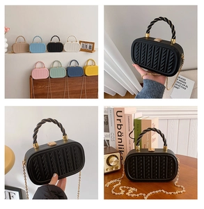 Detailed view of fashionable mini box bag featuring a braided texture and gold chain strap