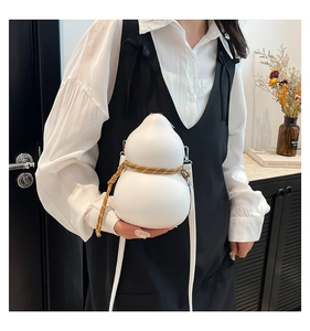 Detail of white gourd-shaped crossbody bag with brown woven rope and silver hardware