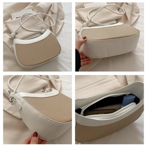 Vue détaillée du sac à main en toile et cuir avec doublure et coutures texturées