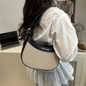 Sac hobo minimaliste en toile avec garniture en cuir noir et détail de nœud pour femmes