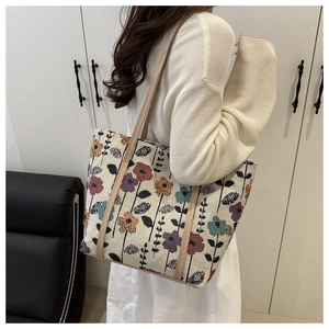 Detail view of vintage floral tapestry tote bag with slim shoulder straps and large capacity