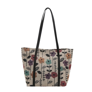 Retro floral tote bag with vintage flower patterns and slim black shoulder straps