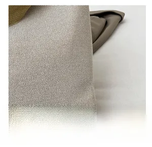 Close-up showing the premium woven mesh texture of the cream white tote bag material