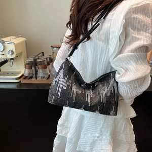 Minimalist grey sequined shoulder bag with stylish abstract lines and leather strap