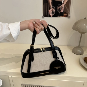 Retro canvas and black leather patchwork tote bag with gold zipper and detachable strap