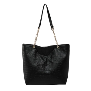 Black crocodile pattern tote bag with gold chain strap and spacious minimalist design