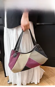 Detailansicht der Damen Vintage-Canvas-Tragetasche mit buntem Patchwork-Design