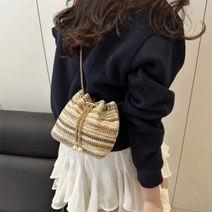 Woven mini bucket bag with stripes, gold chain strap, and pearl charms for women
