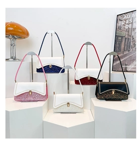 Detailed view of luxury sequined small square handbags in five diverse vibrant colors