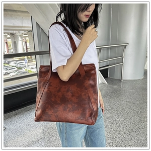 Brown vintage large capacity tote bag with marble texture pattern in street fashion view