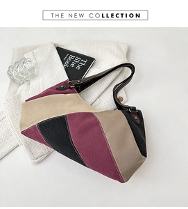 Detail der Canvas Hobo-Tasche im Color-Block-Design mit Lederriemen und Metallring