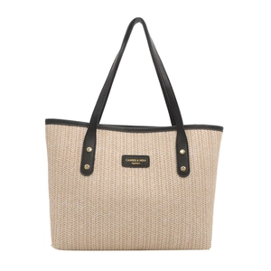 Large beige woven straw tote bag with black handles and leather logo patch for women